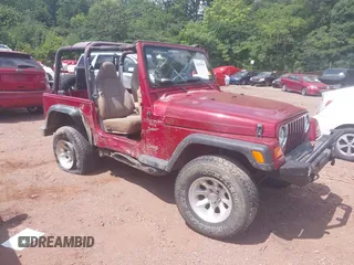 1999 Jeep Wrangler Sport with VIN 1J4FY19S5XP443351, listed as a IAAI auction lot 42650903 with 154,389 mi miles and . Bid and sale history available at DreamBid. Image 1.