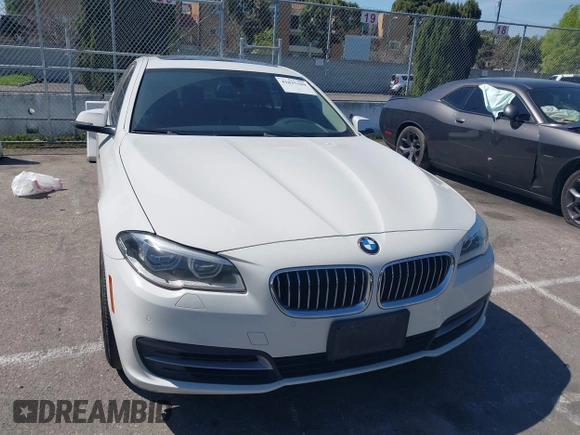 2014 BMW 5 Series 528i with VIN WBA5A5C55ED500014, listed as a IAAI auction lot 41835309 with 114,436 mi miles and . Bid and sale history available at DreamBid. Image 12.