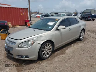 2012 Chevrolet Malibu LTZ with VIN 1G1ZG5E75CF273189, listed as a IAAI auction lot 42065802 with 153,869 mi miles and . Bid and sale history available at DreamBid. Image 2.