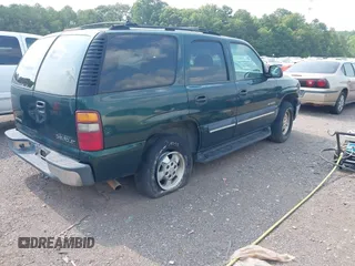 2002 Chevrolet Tahoe LS with VIN 1GNEC13V92J308220, listed as a IAAI auction lot 42362047 with 230,859 mi miles and . Bid and sale history available at DreamBid. Image 4.