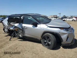 2021 Toyota RAV4 Hybrid XSE with VIN 2T3E6RFVXMW025145, listed as a Copart auction lot 51865655 with 201,591 mi miles and Salvage Title. Bid and sale history available at carsss.com. Image 4.