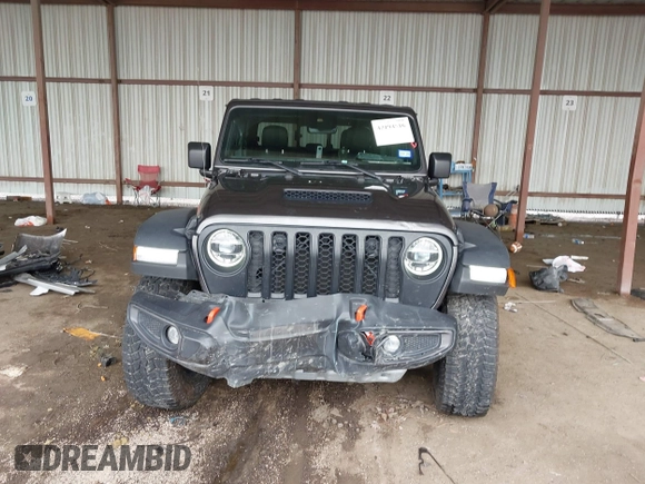 2022 Jeep Gladiator Mojave z VIN 1C6JJTEG8NL182360, wystawiony jako IAAI lot #42194516 z przebiegiem 67 658 mil mil oraz . Historia ofert i sprzedaży dostępna na DreamBid. Obrazek 12.