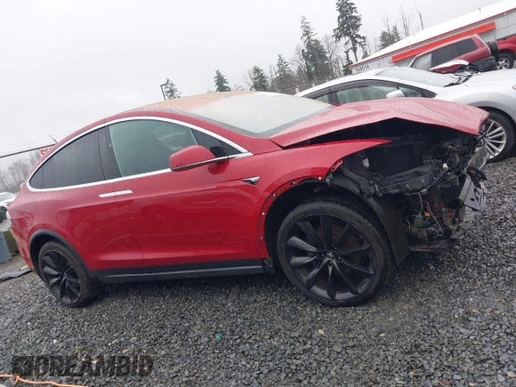 2019 Tesla Model X 75D with VIN 5YJXCBE23KF207739, listed as a IAAI auction lot 41808567 with 191,233 mi miles and . Bid and sale history available at DreamBid. Image 14.