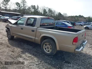 2003 Dodge Dakota SLT with VIN 1D7HL48X53S348636, listed as a IAAI auction lot 41329221 with 133,075 mi miles. Bid and sale history available at carsss.com. Image 3.