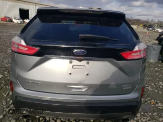 2020 Ford Edge SEL z VIN 2FMPK4J95LBA29912, wystawiony jako Copart lot #82968534 z przebiegiem 104 083 mil mil oraz Szkoda całkowita • Salvage title. Historia ofert i sprzedaży dostępna na DreamBid. Obrazek 6.