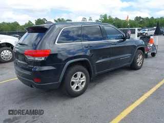 2016 Jeep Grand Cherokee Laredo with VIN 1C4RJEAG0GC320683, listed as a IAAI auction lot 42379025 with 124,750 mi miles and . Bid and sale history available at DreamBid. Image 4.