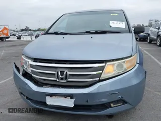 2012 Honda Odyssey EX-L with VIN 5FNRL5H66CB061847, listed as a IAAI auction lot 42162377 with 217,204 mi miles and . Bid and sale history available at DreamBid. Image 12.
