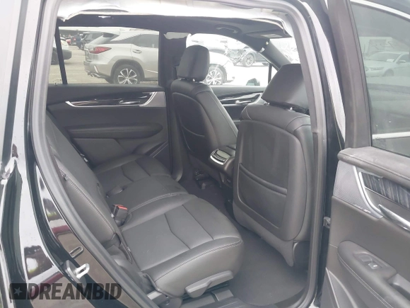 2023 Cadillac XT6 FWD Premium Luxury with VIN 1GYKPCRS8PZ231089, listed as a IAAI auction lot 41500954 with 36,455 mi miles and . Bid and sale history available at DreamBid. Image 8.