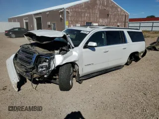 2019 GMC Yukon XL SLT with VIN 1GKS2GKC6KR109858, listed as a Copart auction lot 72545704 with 107,793 mi miles and Salvage Title. Bid and sale history available at carsss.com. Image 1.