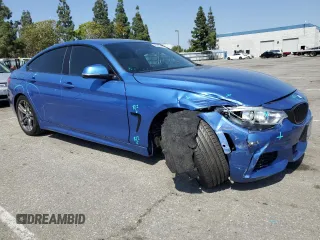 2015 BMW 4 Series 435i with VIN WBA4B1C59FD955421, listed as a Copart auction lot 56347345 with 42,922 mi miles and Salvage title. Bid and sale history available at DreamBid. Image 4.