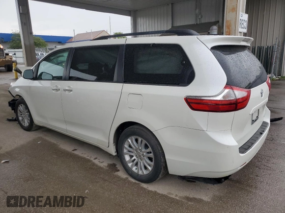 2016 Toyota Sienna XLE with VIN 5TDYK3DC8GS729616, listed as a Copart auction lot 59748995 with 144,469 mi miles and Salvage title. Bid and sale history available at DreamBid. Image 2.