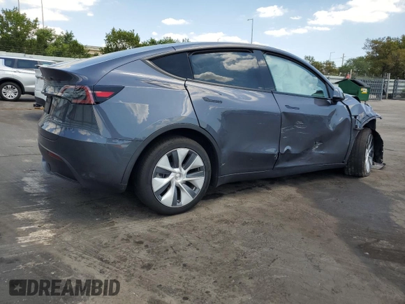 2023 Tesla Model Y Long Range with VIN 7SAYGDEE9PF885405, listed as a Copart auction lot 52858105 with 23,424 mi miles and Non Repairable. Bid and sale history available at DreamBid. Image 3.