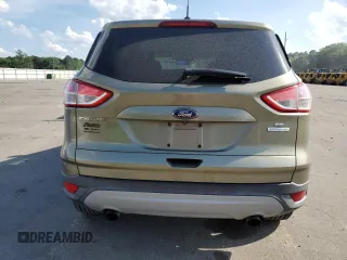 2014 Ford Escape SE z VIN 1FMCU0GX2EUA26924, wystawiony jako Copart lot #55389485 z przebiegiem 102 537 mil mil oraz Szkoda całkowita • Salvage title. Historia ofert i sprzedaży dostępna na DreamBid. Obrazek 6.