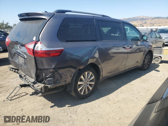 2015 Toyota Sienna Limited с VIN 5TDDK3DC7FS104041, выставлен на аукционе Copart как лот 62410335 с пробегом 112 755 миль миль и Списание • Salvage title. История ставок и продаж доступна на DreamBid. Изображение 3.