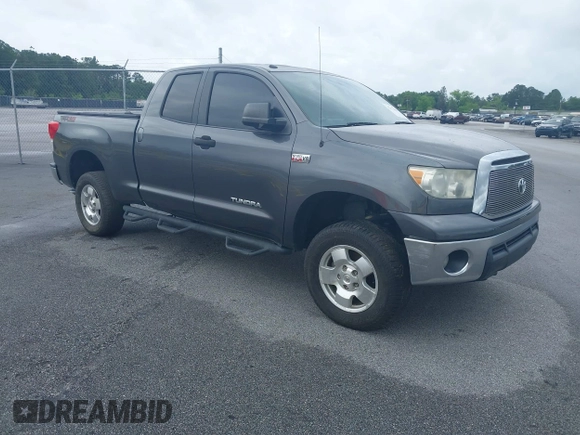 2012 Toyota Tundra z VIN 5TFUW5F10CX265994, wystawiony jako IAAI lot #42172968 z przebiegiem 197 493 mil mil oraz . Historia ofert i sprzedaży dostępna na DreamBid. Obrazek 1.