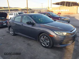 2016 Honda Civic Sedan LX with VIN 2HGFC2F55GH532108, listed as a IAAI auction lot 41860382 with 124,106 mi miles. Bid and sale history available at carsss.com. Image 1.