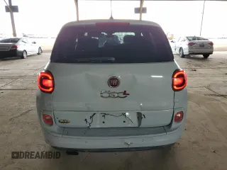 2014 FIAT 500L Easy с VIN ZFBCFABH6EZ024863, выставлен на аукционе Copart как лот 65282035 с пробегом 99 407 миль миль и Чистый • Clean title. История ставок и продаж доступна на DreamBid. Изображение 6.