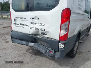 2015 Ford Transit Cargo with VIN 1FTNR1ZM6FKA34609, listed as a IAAI auction lot 42635875 with 214,750 mi miles and . Bid and sale history available at DreamBid. Image 6.