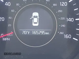 2014 Kia Optima EX z VIN 5XXGN4A70EG335090, wystawiony jako IAAI lot #42272655 z przebiegiem 165 795 mil mil oraz . Historia ofert i sprzedaży dostępna na DreamBid. Obrazek 7.