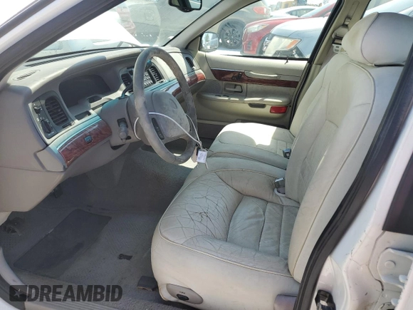 2000 Mercury Grand Marquis LS z VIN 2MEFM75W3YX689886, wystawiony jako Copart lot #54128735 z przebiegiem 54 819 mil mil oraz Szkoda całkowita • Salvage title. Historia ofert i sprzedaży dostępna na DreamBid. Obrazek 7.