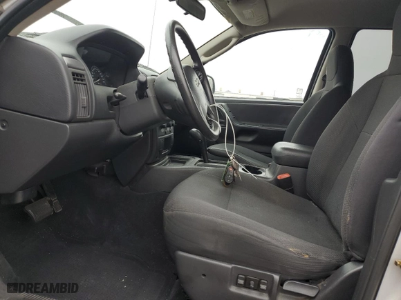 2004 Jeep Grand Cherokee Laredo with VIN 1J4GX48S64C151124, listed as a Copart auction lot 52669445 with 152,970 mi miles and Salvage Title. Bid and sale history available at carsss.com. Image 7.