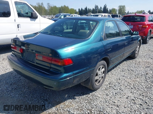 1998 Toyota Camry LE z VIN JT2BF28K4W0101312, wystawiony jako IAAI lot #42116546 z przebiegiem 365 712 mil mil oraz . Historia ofert i sprzedaży dostępna na DreamBid. Obrazek 4.