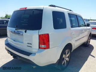2013 Honda Pilot Touring with VIN 5FNYF4H96DB067995, listed as a IAAI auction lot 41977403 with 129,223 mi miles. Bid and sale history available at carsss.com. Image 4.