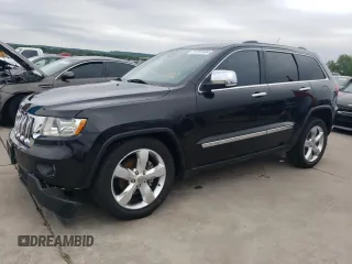 2013 Jeep Grand Cherokee Overland with VIN 1C4RJECG5DC528650, listed as a Copart auction lot 51581684 with 141,050 mi miles and Clean Title. Bid and sale history available at carsss.com. Image 1.