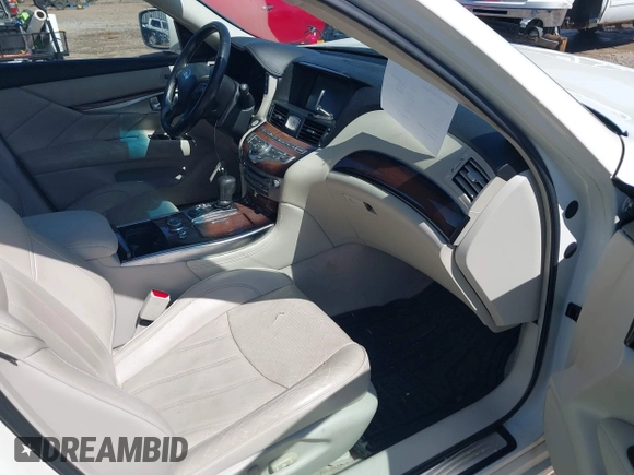 2011 Infiniti M with VIN JN1BY1AP8BM325061, listed as a IAAI auction lot 41765214 with 289,990 mi miles and . Bid and sale history available at DreamBid. Image 5.