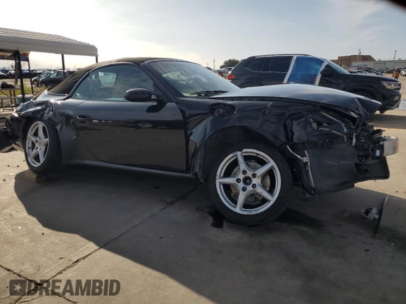 2006 Porsche 911 Carrera with VIN WP0CA29986S757233, listed as a Copart auction lot 87251344 with 87,832 mi miles and Salvage Title. Bid and sale history available at DreamBid. Image 4.