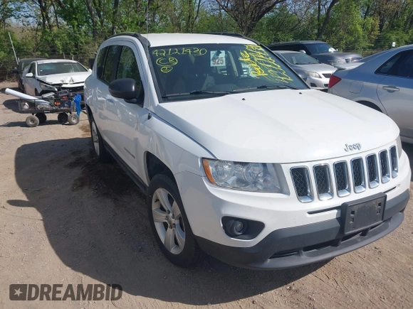 2012 Jeep Compass Latitude with VIN 1C4NJCEA7CD639298, listed as a IAAI auction lot 42121430 with 166,409 mi miles. Bid and sale history available at carsss.com. Image 1.