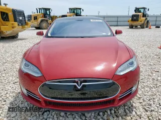2014 Tesla Model S 60 with VIN 5YJSA1H18EFP38582, listed as a Copart auction lot 56581735 with 69,106 mi miles and Salvage title. Bid and sale history available at DreamBid. Image 5.