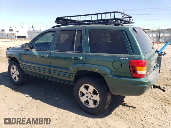 1999 Jeep Grand Cherokee Limited with VIN 1J4GW68SXXC581130, listed as a Copart auction lot 43532245 with 265,886 mi miles and Salvage Title. Bid and sale history available at carsss.com. Image 2.