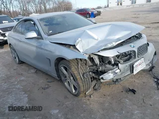 2015 BMW 4 Series 428i xDrive z VIN WBA3N9C53FK247985, wystawiony jako IAAI lot #41395534 z przebiegiem 76 856 mil mil oraz . Historia ofert i sprzedaży dostępna na DreamBid. Obrazek 1.