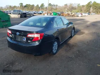 2014 Toyota Camry Hybrid LE with VIN 4T1BD1FK8EU113508, listed as a IAAI auction lot 42068470 with 386,932 mi miles. Bid and sale history available at carsss.com. Image 4.