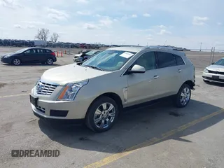 2015 Cadillac SRX Luxury Collection with VIN 3GYFNEE32FS638242, listed as a IAAI auction lot 41866683 with 32,277 mi miles. Bid and sale history available at carsss.com. Image 2.