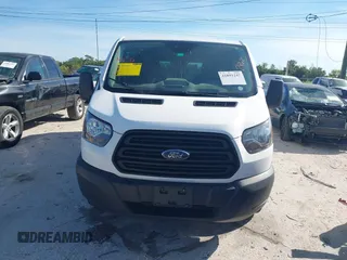 2019 Ford Transit z VIN 1FTYR2ZM1KKB25574, wystawiony jako IAAI lot #41891247 z przebiegiem 142 627 mil mil oraz . Historia ofert i sprzedaży dostępna na DreamBid. Obrazek 12.