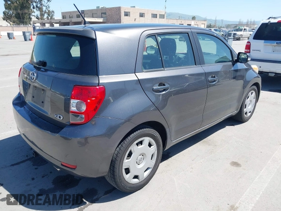 2008 Scion xD with VIN JTKKU10438J027228, listed as a IAAI auction lot 41973795 with 205,044 mi miles. Bid and sale history available at carsss.com. Image 4.