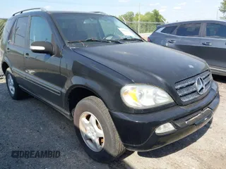 2004 Mercedes-Benz M-Class 3.5L with VIN 4JGAB57E24A468675, listed as a IAAI auction lot 42056078 with 197,169 mi miles. Bid and sale history available at carsss.com. Image 1.
