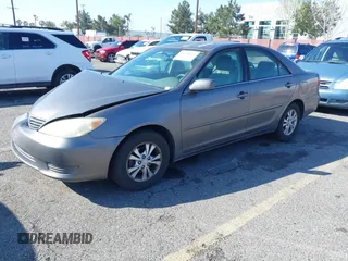 2005 Toyota Camry LE with VIN 4T1BF32K25U603812, listed as a IAAI auction lot 41740671 with 242,316 mi miles and . Bid and sale history available at DreamBid. Image 2.
