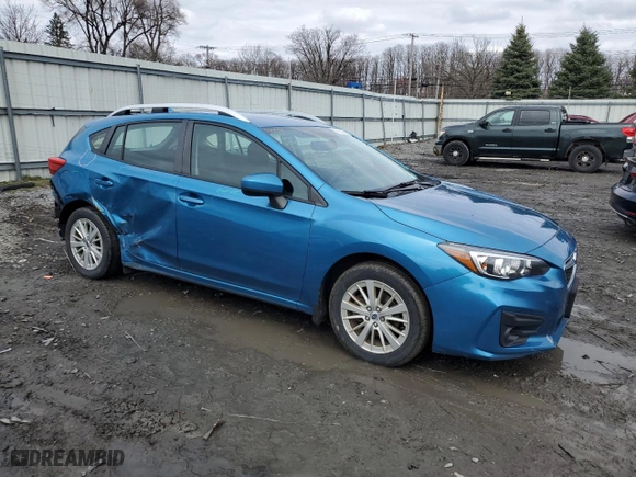 2017 Subaru Impreza Premium with VIN 4S3GTAB66H3751904, listed as a Copart auction lot 52638985 with 64,909 mi miles and Salvage Title. Bid and sale history available at carsss.com. Image 4.