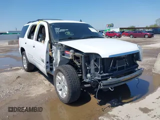 2011 GMC Yukon SLT z VIN 1GKS1CE00BR210794, wystawiony jako IAAI lot #41958998 z przebiegiem 225 407 mil mil oraz . Historia ofert i sprzedaży dostępna na DreamBid. Obrazek 1.