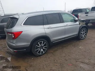 2019 Honda Pilot Touring 7-Passenger with VIN 5FNYF6H68KB050310, listed as a IAAI auction lot 41730210 with 100,245 mi miles. Bid and sale history available at carsss.com. Image 4.