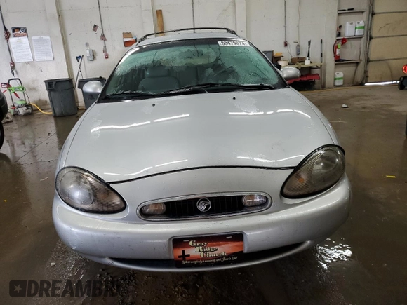 1999 Mercury Sable with VIN 1MEFM58S6XA647250, listed as a Copart auction lot 83479674 with 166,550 mi miles and Salvage title. Bid and sale history available at DreamBid. Image 5.
