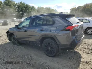 2023 Toyota RAV4 Hybrid XSE with VIN 4T3E6RFV1PU112579, listed as a Copart auction lot 74387924 with 103,340 mi miles and Salvage title. Bid and sale history available at DreamBid. Image 2.