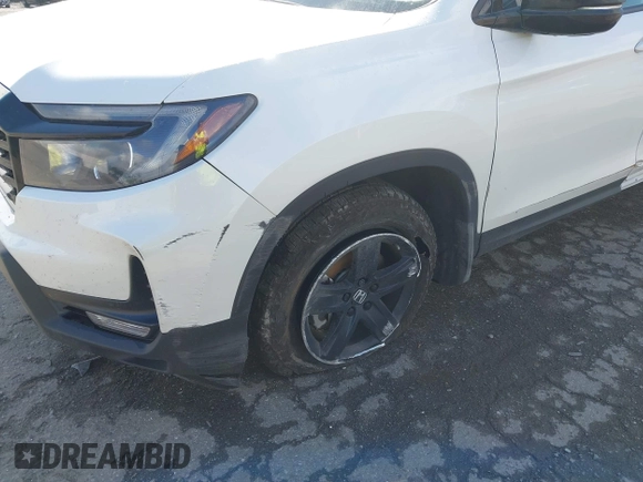 2023 Honda Ridgeline Black Edition with VIN 5FPYK3F88PB018969, listed as a IAAI auction lot 42264424 with 19,193 mi miles and . Bid and sale history available at DreamBid. Image 6.