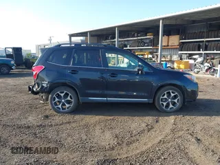 2015 Subaru Forester 2.0XT Touring with VIN JF2SJGUC0FH516972, listed as a IAAI auction lot 41483033 with 103,970 mi miles. Bid and sale history available at carsss.com. Image 13.