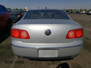 2004 Volkswagen Phaeton V8 z VIN WVWAF63D348008461, wystawiony jako Copart lot #75664804 z przebiegiem 207 769 mil mil oraz Szkody całkowita. Historia ofert i sprzedaży dostępna na DreamBid. Obrazek 6.