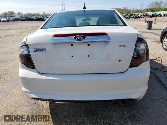 2012 Ford Fusion SEL z VIN 3FAHP0JAXCR220259, wystawiony jako Copart lot #53913975 z przebiegiem 145 424 mil mil oraz Szkoda całkowita • Salvage title. Historia ofert i sprzedaży dostępna na DreamBid. Obrazek 6.