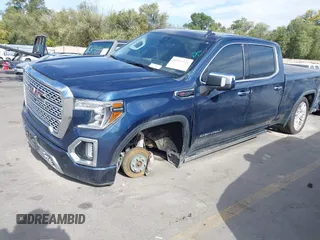2020 GMC Sierra 1500 Denali with VIN 1GTU9FEL3LZ195864, listed as a IAAI auction lot 40593921 with 74,982 mi miles and . Bid and sale history available at DreamBid. Image 17.